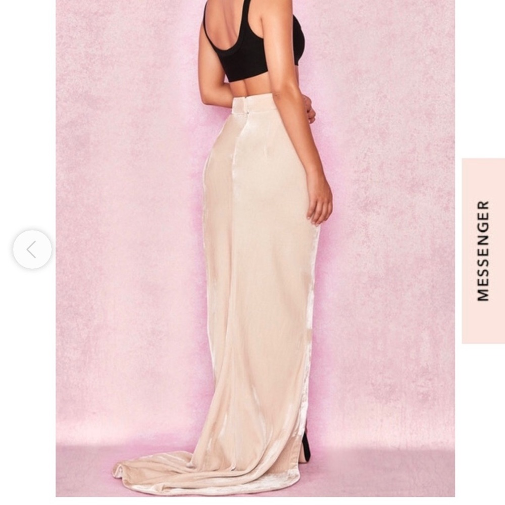 Long velvet skirt with high split.